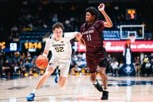 Honor Huff nails eight 3-pointers, WVU runs past Little Rock (Ark.)